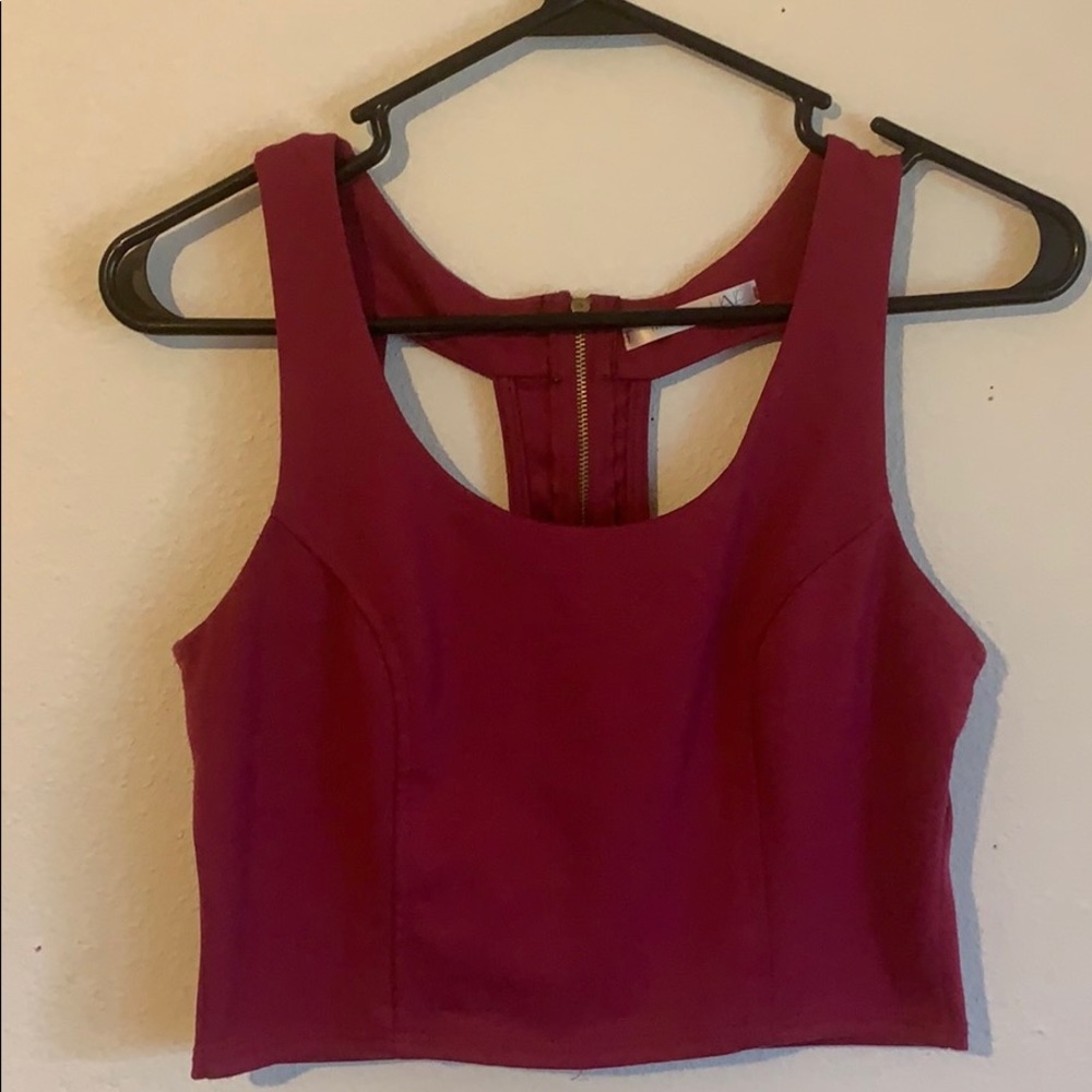 Cute!! Zip up, crossed open back